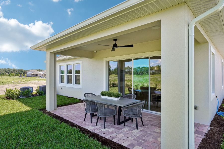 Exterior details and patio area of a home in Northlake at Ovation, Winter Garden (Image 3).