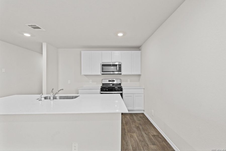 Furnished interior view inside a new home in Redbird Ranch, San Antonio (Image 8).