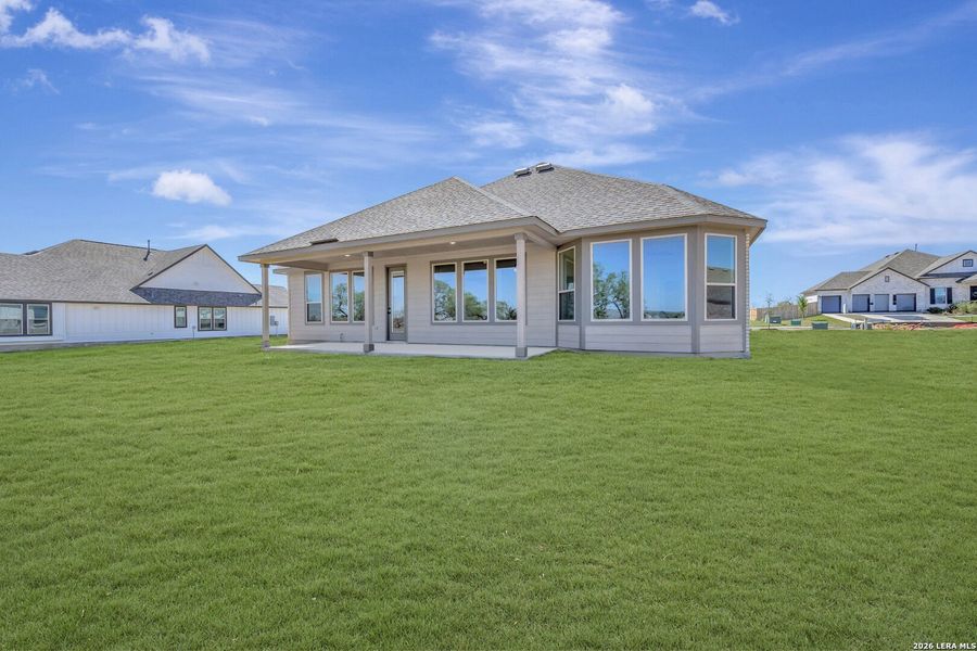 Exterior details and patio area of a home in Preserve at Annabelle Ranch, San Antonio (Image 4).