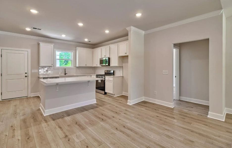Furnished interior view inside a new home in Satchel Ford, Columbia (Image 5).