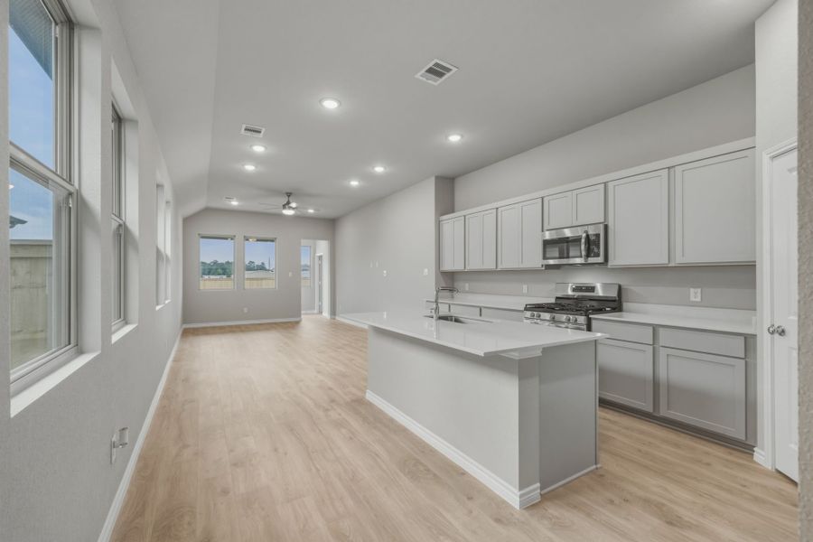 Kitchen in the Cedar home plan by Trophy Signature Homes – REPRESENTATIVE PHOTO Kitchen in the Cedar home plan by Trophy Signature Homes – REPRESENTATIVE PHOTO