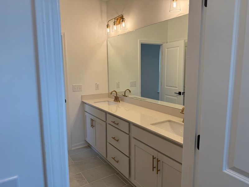 Primary Bath featuring the AW Collection® Serene - Clean forms offer quiet luxury.