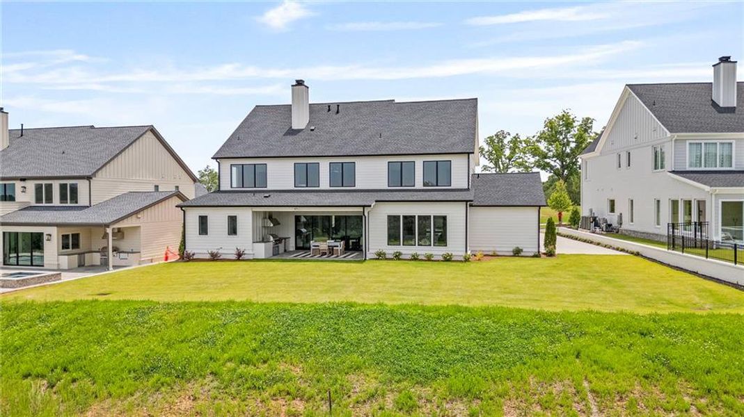 Front exterior of a new home in , Ball Ground, GA, highlighting curb appeal (Image 27).