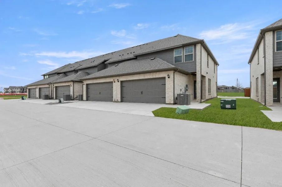 Front exterior of a new home in Sanger Circle, Sanger, TX, highlighting curb appeal (Image 15).