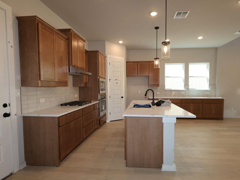 Furnished interior view inside a new home in Heritage, Dripping Springs (Image 7).