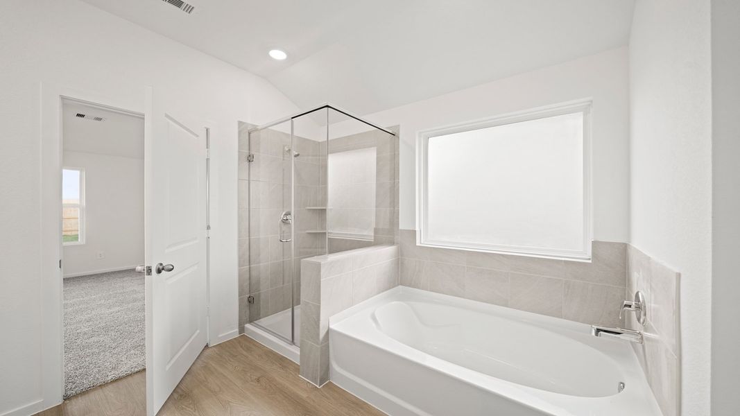 Furnished interior view inside a new home in Sunterra Lakes, Brookshire (Image 9).