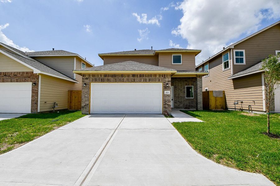 Front exterior of a new home in , Houston, TX, highlighting curb appeal (Image 20). Front exterior of a new home in , Houston, TX, highlighting curb appeal (Image 20).