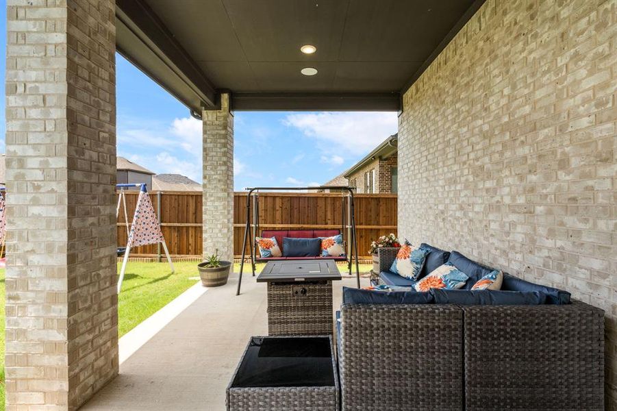 Covered patio featuring recessed lighting and a concrete slab Covered patio featuring recessed lighting and a concrete slab