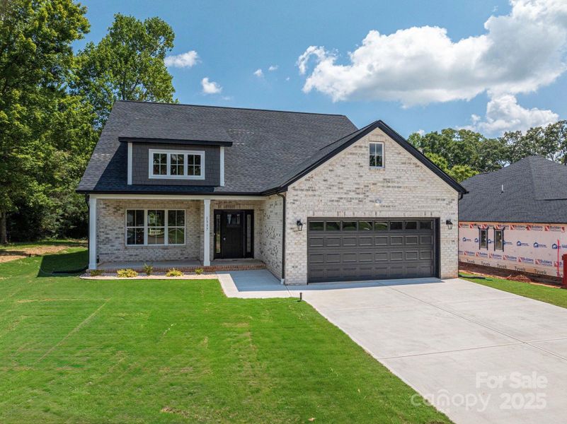 Front exterior of a new home in , Hickory, NC, highlighting curb appeal (Image 2). Front exterior of a new home in , Hickory, NC, highlighting curb appeal (Image 2).