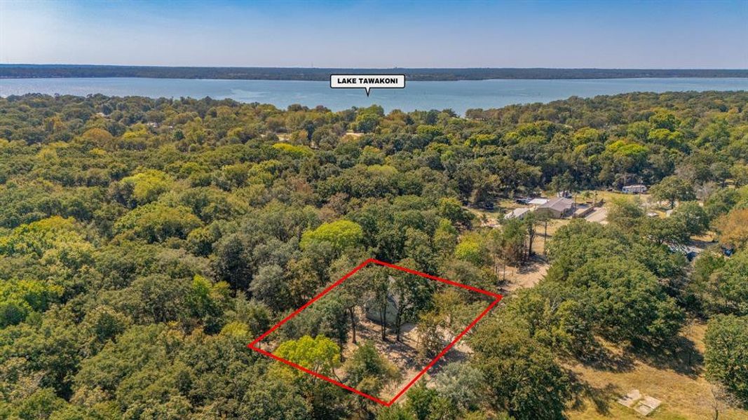 Front exterior of a new home in , Quinlan, TX, highlighting curb appeal (Image 17). Front exterior of a new home in , Quinlan, TX, highlighting curb appeal (Image 17).