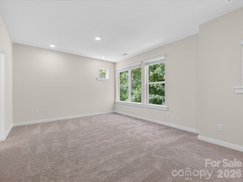 Spacious, unfurnished interior of a new home in Central Living at Craig, Charlotte (Image 24).