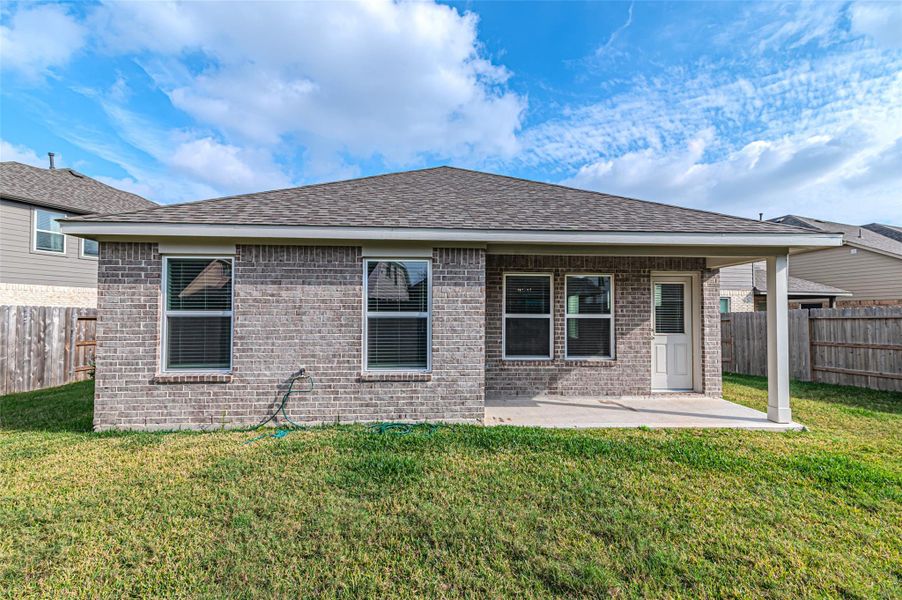 Exterior details and patio area of a home in Marvida, Cypress (Image 27).