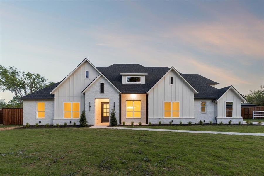 Front exterior of a new home in , Rowlett, TX, highlighting curb appeal (Image 23). Front exterior of a new home in , Rowlett, TX, highlighting curb appeal (Image 23).