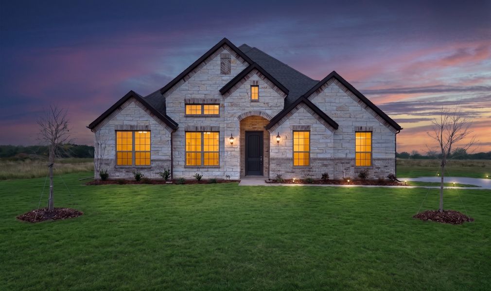 Front exterior of a new home in Mallard Point, Greenville, TX, highlighting curb appeal (Image 2). Front exterior of a new home in Mallard Point, Greenville, TX, highlighting curb appeal (Image 2).