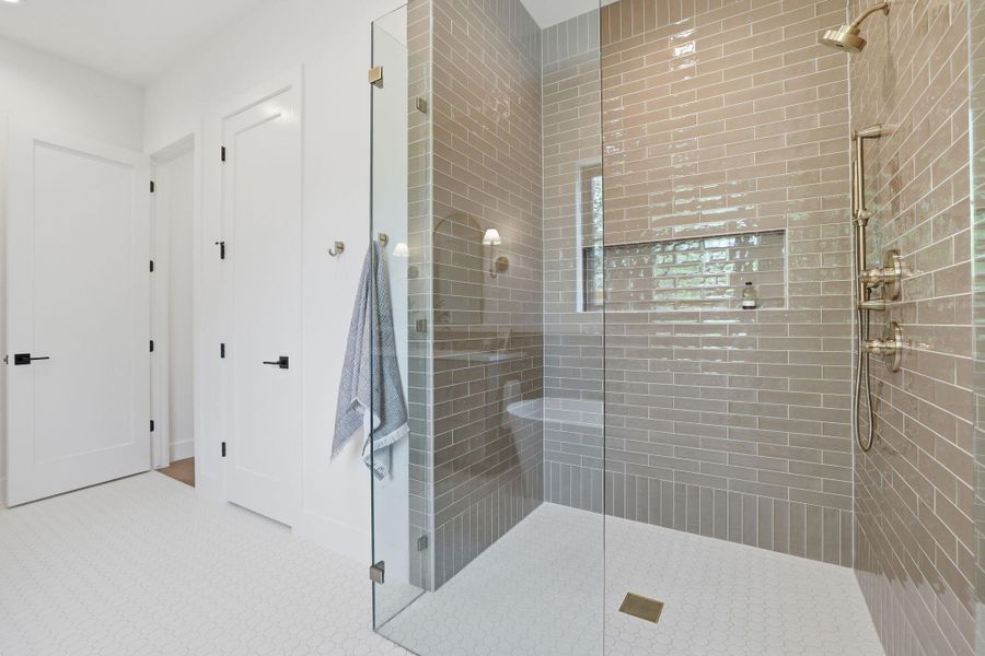 Bathroom featuring a shower stall