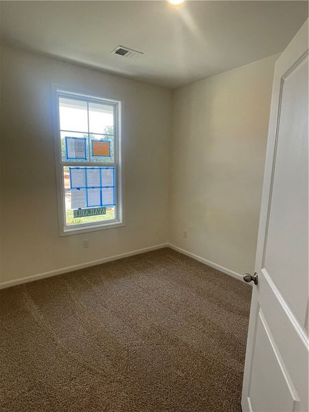 Spacious, unfurnished interior of a new home in Springwood Grove, Central (Image 28).