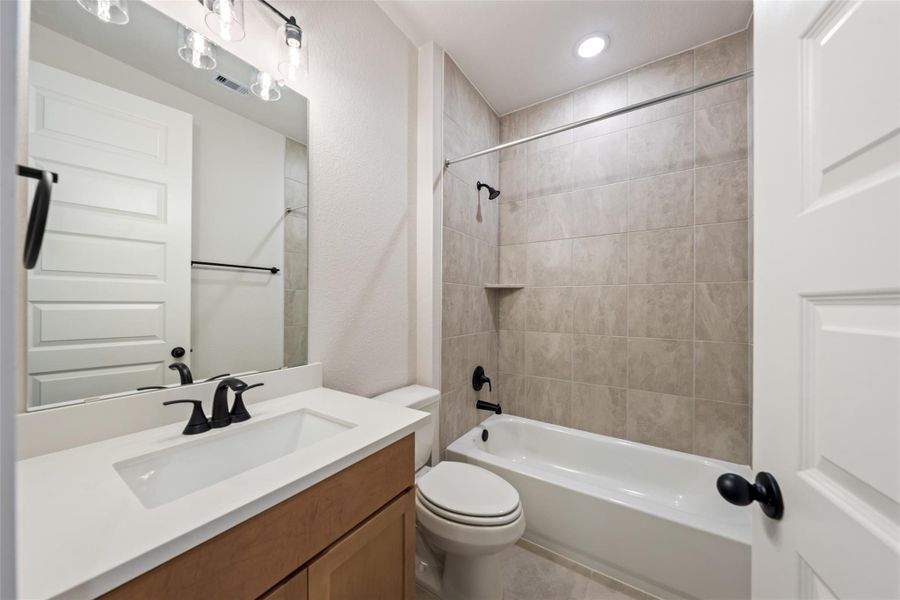 Furnished interior view inside a new home in Deer Pines, Conroe (Image 14).