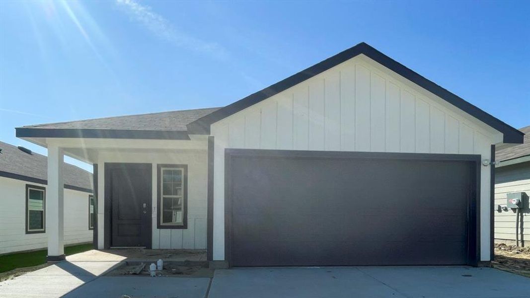 Front exterior of a new home in Wildwood, Royse City, TX, highlighting curb appeal (Image 1). Front exterior of a new home in Wildwood, Royse City, TX, highlighting curb appeal (Image 1).
