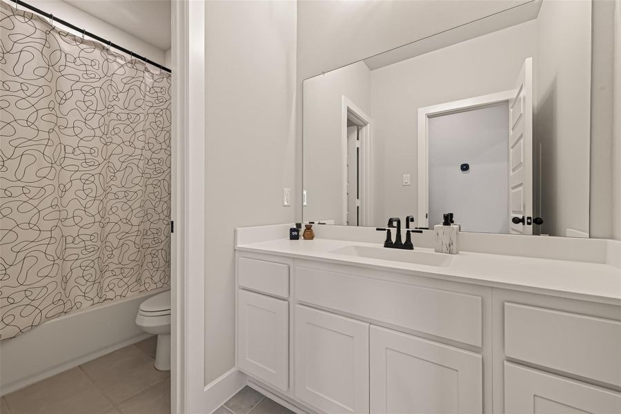 Upstairs secondary bathrooms with tub and shower combination Upstairs secondary bathrooms with tub and shower combination