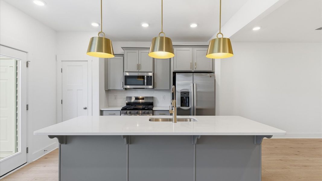 Well-designed kitchen with a center island and tasteful finishes that elevate everyday living located in Anderson, SC