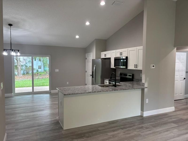Furnished interior view inside a new home in , Dunnellon (Image 6).