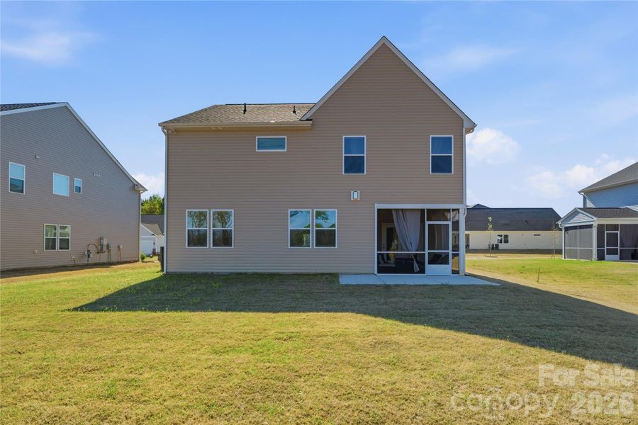 Exterior details and patio area of a home in Clairmont, Charlotte (Image 25).