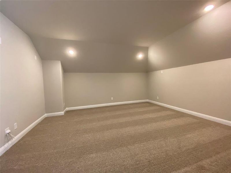 Media room is all set u p for movie nights, sorts, or gaming with bo windows, can lights, and pre-wired for surround sound Media room is all set u p for movie nights, sorts, or gaming with bo windows, can lights, and pre-wired for surround sound