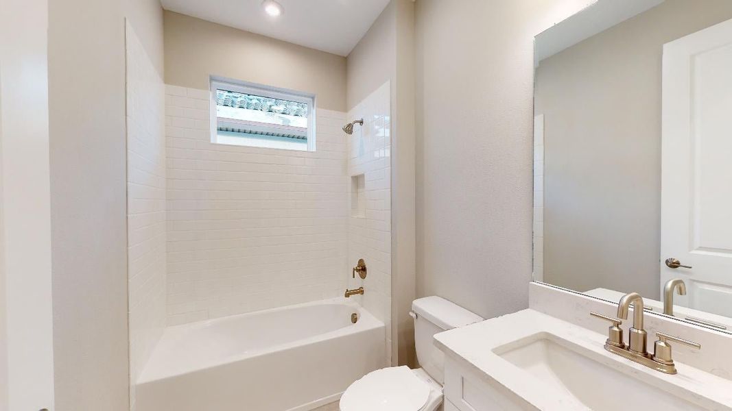 Representative furnished interior of a home built from the Azzurro by Taylor Morrison in Esplanade by the Islands, Naples (Image 4).