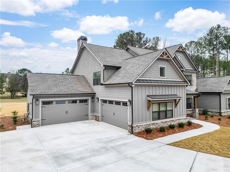 Front exterior of a new home in Stonegate, Monroe, GA, highlighting curb appeal (Image 4).