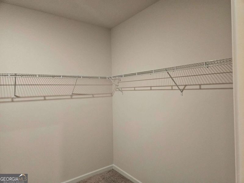 Spacious, unfurnished interior of a new home in Maddox Station, Eatonton (Image 24).