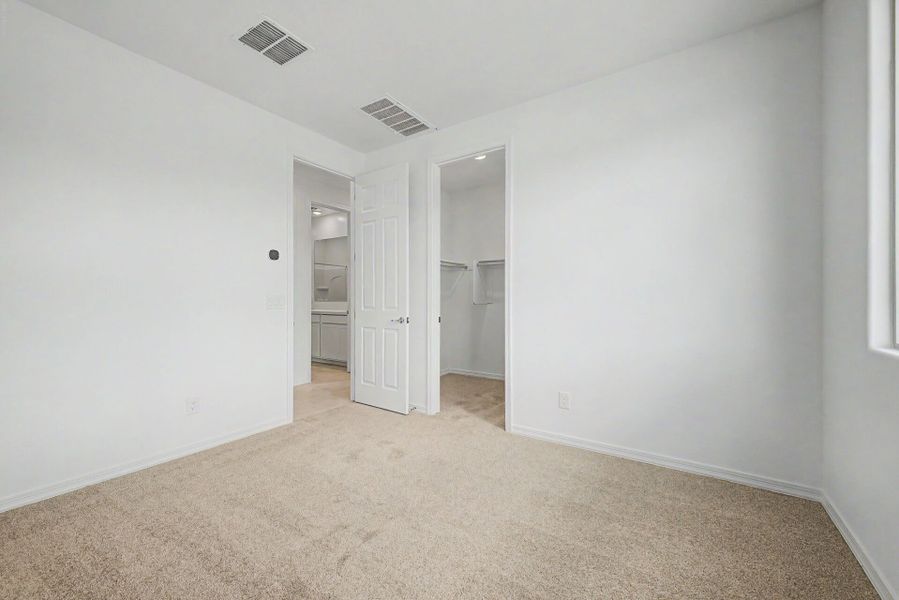Spacious, unfurnished interior of a new home in Empire Pointe, Queen Creek (Image 14). Spacious, unfurnished interior of a new home in Empire Pointe, Queen Creek (Image 14).