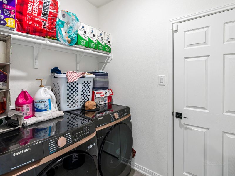 Utility room and door to garage Utility room and door to garage