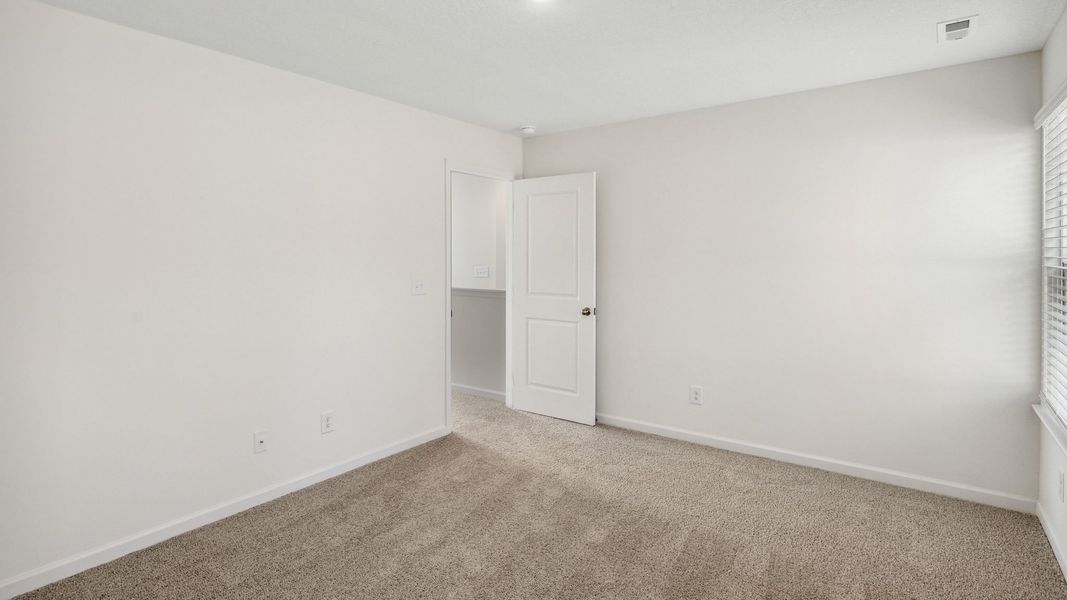 Representative unfurnished interior of a home built from the Bennet by D.R. Horton in The Hideaway at Fox Meadows, Bluff City (Image 17).