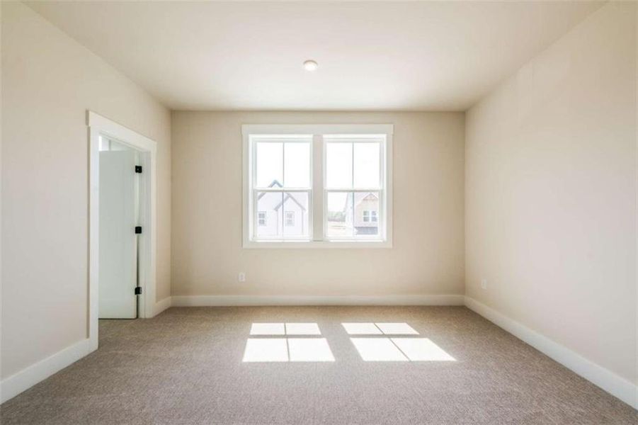 Spacious, unfurnished interior of a new home in The Paddocks at Doc Hughes, Buford (Image 44).