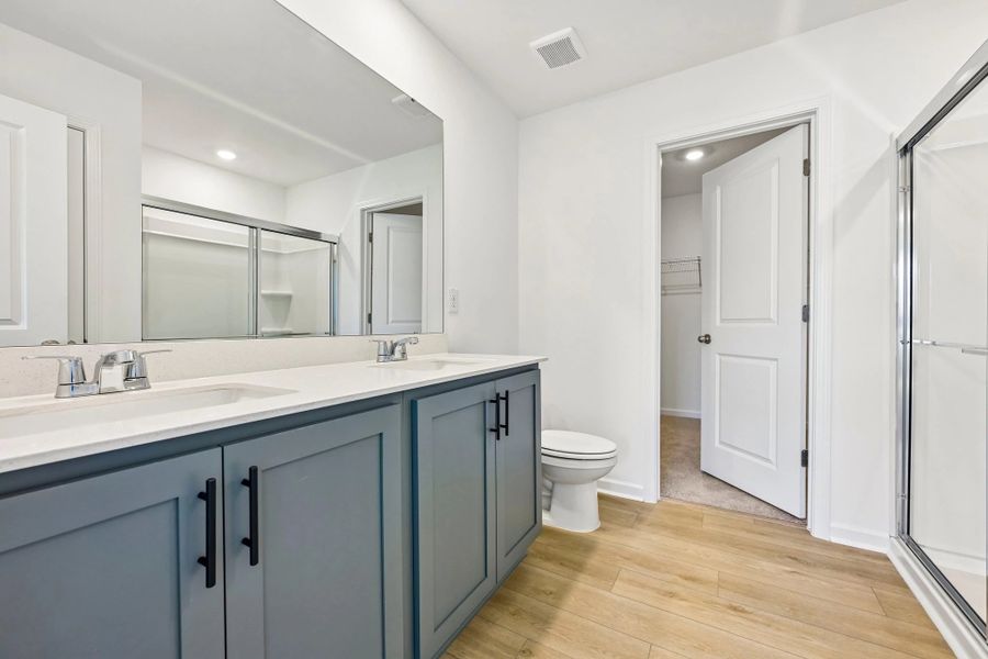 Primary Bath featuring the AW Collection® Minimalist - Sleek finishes and dramatic contrasts shine.