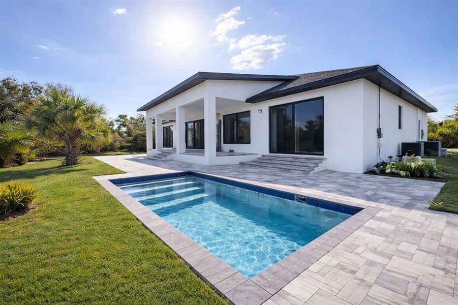 Exterior details and patio area of a home in , Port Charlotte (Image 17).
