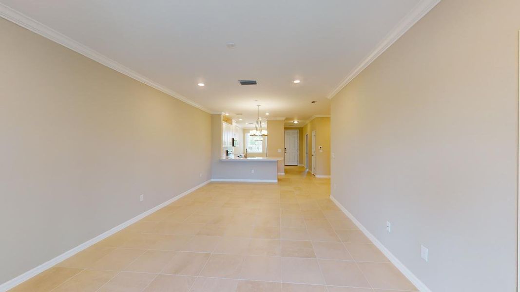 Representative unfurnished interior of a home built from the Caserta VII by Taylor Morrison in Esplanade at Rivergrass Condos, Naples (Image 4).