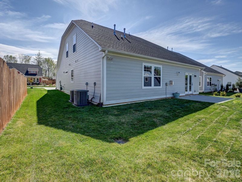 Flat, level yard with minimal lawn maintenance.