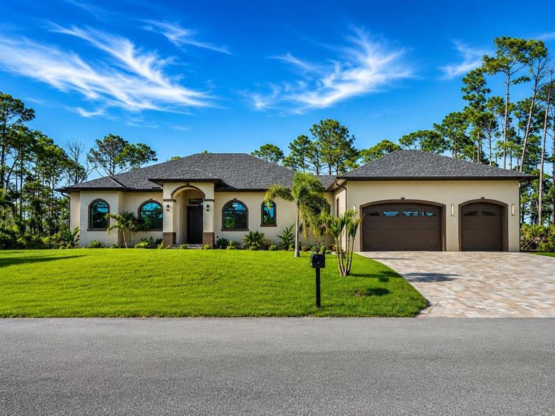 Front exterior of a new home in , Port Charlotte, FL, highlighting curb appeal (Image 29).