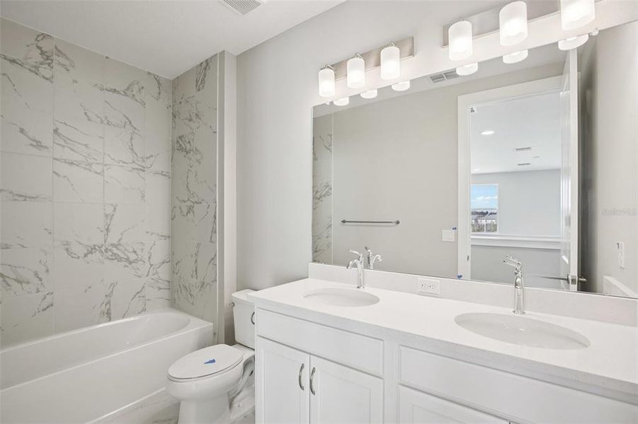 Furnished interior view inside a new home in Lagoon Residences at Epperson, Wesley Chapel (Image 18).