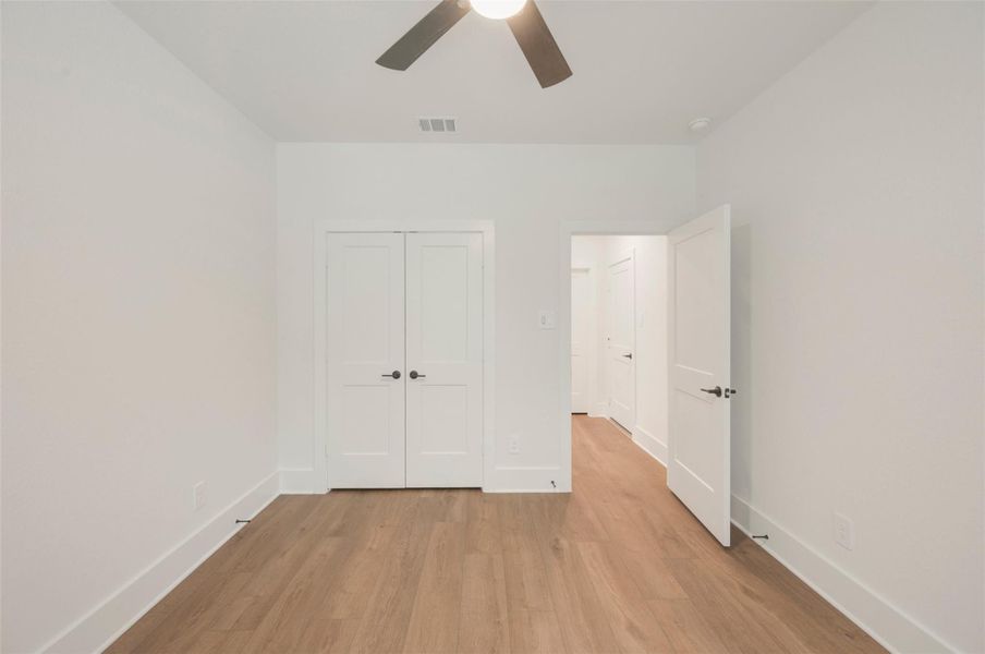 Spacious, unfurnished interior of a new home in The Oaks on 6th Street, Magnolia (Image 11).