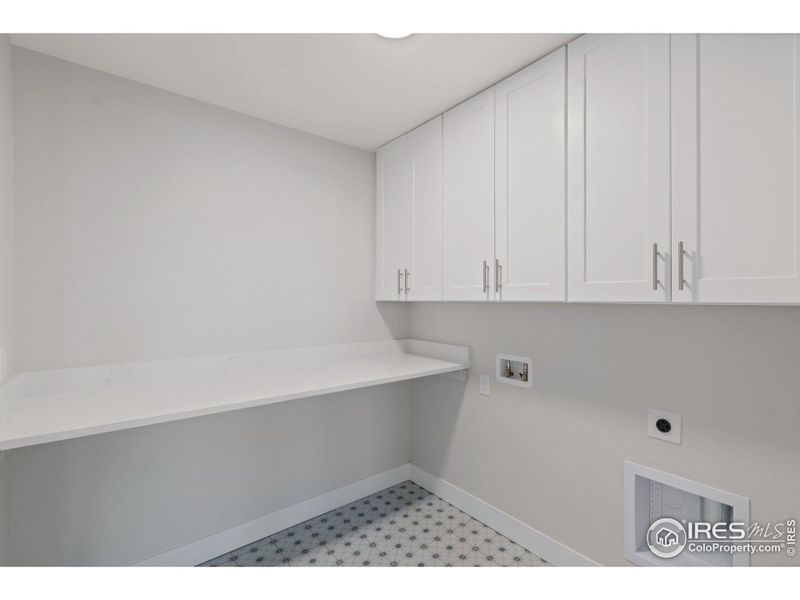 Upstairs Laundry Room w/ Countertop