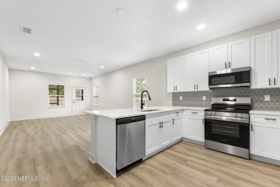 Furnished interior view inside a new home in , Jacksonville (Image 7).