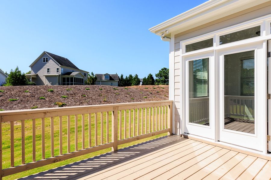Front exterior of a new home in High Grove Oaks, Fuquay Varina, NC, highlighting curb appeal (Image 24). Front exterior of a new home in High Grove Oaks, Fuquay Varina, NC, highlighting curb appeal (Image 24).