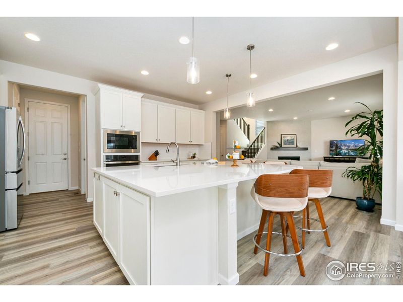 Furnished interior view inside a new home in Kinston at Centerra, Loveland (Image 30).
