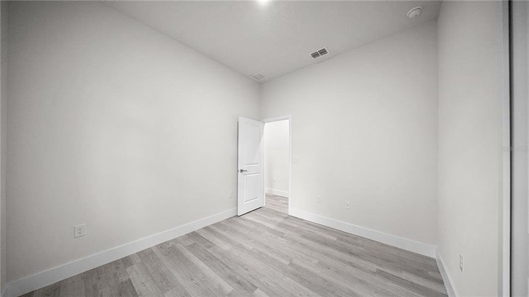Spacious, unfurnished interior of a new home in , Port Charlotte (Image 27).