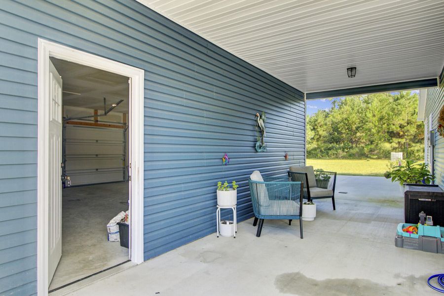Exterior details and patio area of a home in , Cottageville (Image 16).