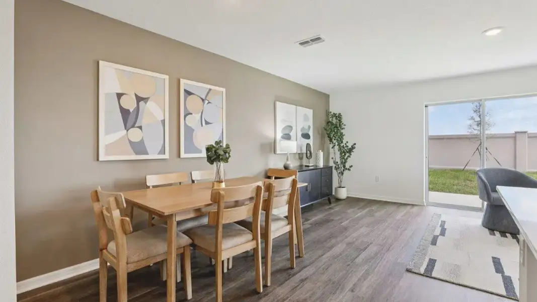 Furnished interior view inside a new home in Atria at Ridgewood Lakes, Davenport (Image 6).
