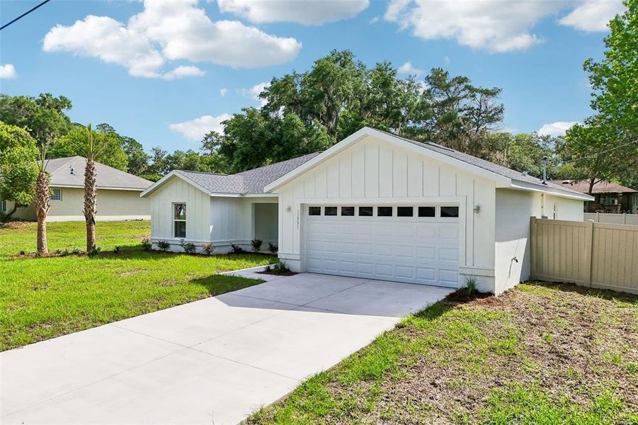 Front exterior of a new home in , Dunnellon, FL, highlighting curb appeal (Image 24).