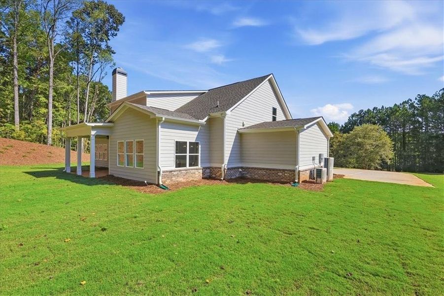 Exterior details and patio area of a home in Bradley Gin, Monroe (Image 34).